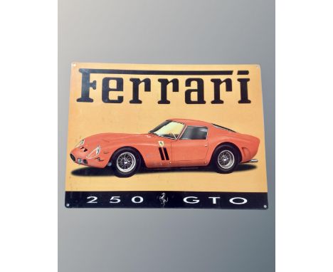 A reproduction Ferrari enamelled metal sign. (width 40cm)