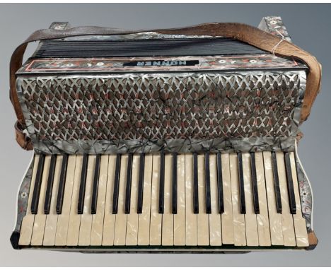 A Hohner Tango IV piano accordion. CONDITION REPORT: Some losses. 