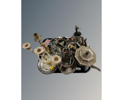 A tray of metalware including candelabra, bottle coasters, part tea service etc.