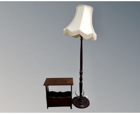 A reproduction magazine table and a standard lamp 