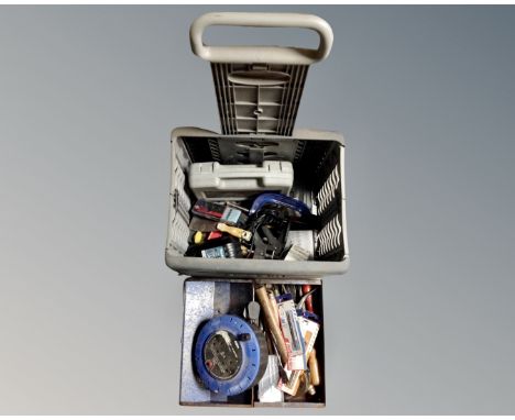 A crate and tool chest containing assorted hand tools, extension table, clamp, electric nailer etc.