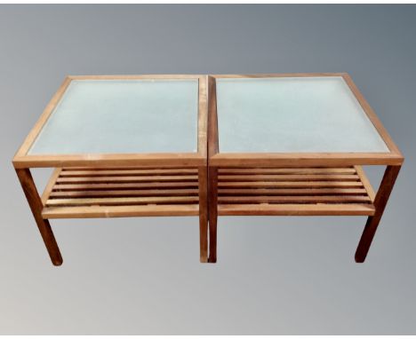 A pair of teak and glass topped square lamp tables. (width 60cm each)