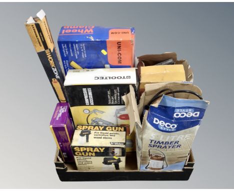 A box of boxed tools including timber sprayer, spray gun, compressor accessory set, siphon pump etc.
