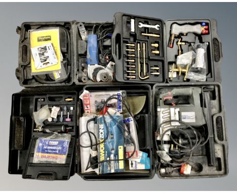 A box of boxed tools including die grinder kit, acetylene torch kit etc.