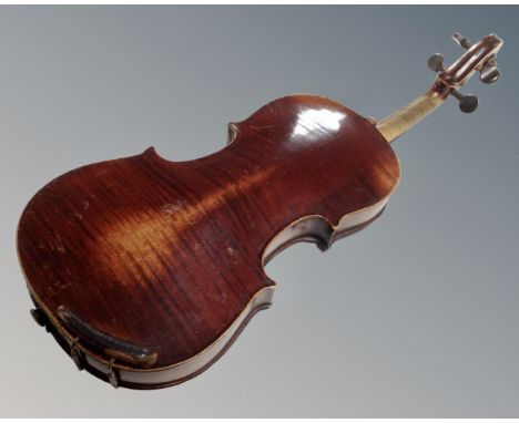 A late 19th century German violin with two-piece 13" back, labelled within, copy of Antonius Stradivarius, made in Germany, w