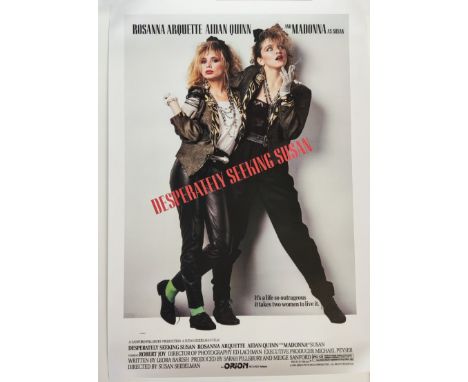 A Madonna Desperately Seeking Susan poster together with vintage photographs of Elvis Presley, Michael Jackson 1992 tour tick