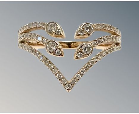 An 18ct rose gold diamond set ring, approximately 0.4ct, size N.  CONDITION REPORT: 4g