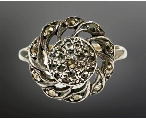 A 9ct gold and silver marcasite ring, size M. 