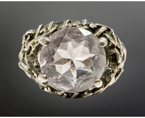 An ornate silver gem set ring, size O. 