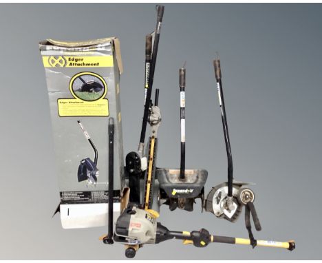 A lawn edger in box together with further garden tools.