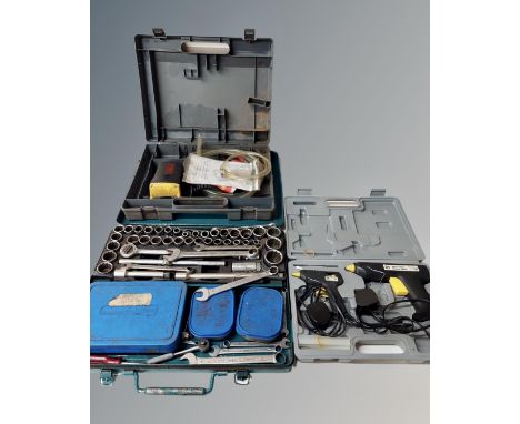 A glue gun, a Bosch 12v pump and a Kamasa tools 124-piece combined socket and spanner set.