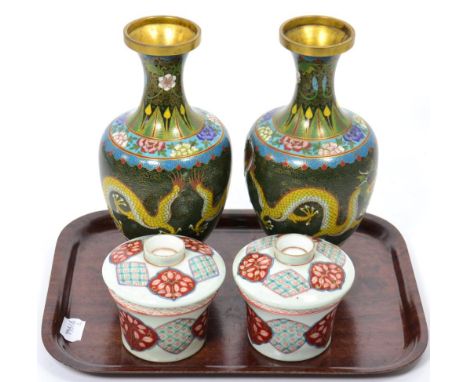 A pair of Japanese porcelain pots and covers; and a pair of cloisonne enamel vases
