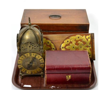 A 19th Century line inlaid mahogany tea caddy, with fitted interior; a brass mounted extending book rack; a leather jewellery