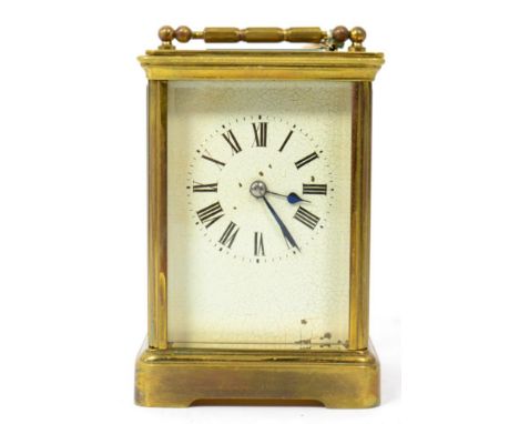 A brass carriage clock with twin barrel striking movement