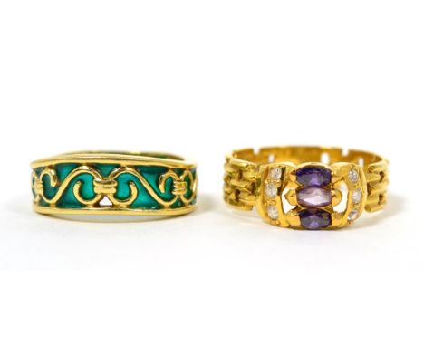 A green plique a jour enamel ring, finger size O, stamped '18K', 5.5g and an amethyst and white stone ring, with brick link s