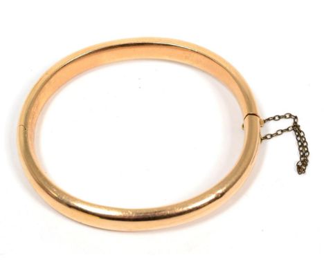 A bangle stamped '15', 17.0g