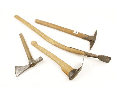An adze, spud and two other tools G 