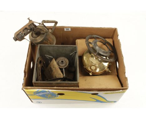 A brass blow lamp and two stoves G 