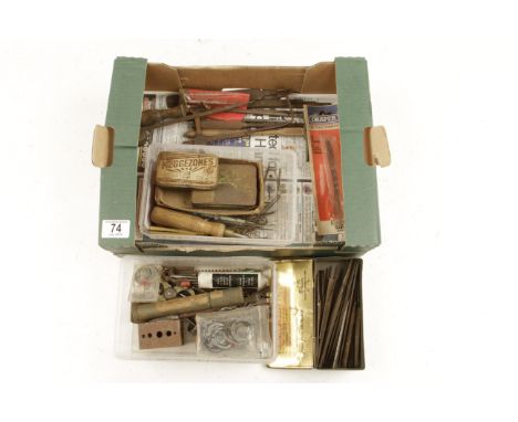 A box of assorted watchmakers tools G 