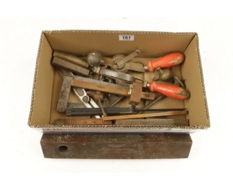Two levels, two bevels, two rules, two plumb bobs, two dip tapes and six other tools G