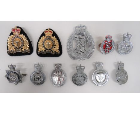 Selection of Various Police Badges consisting plated, QC NZ Police helmet plate. Cap badges including gilt and enamel, QC Roy