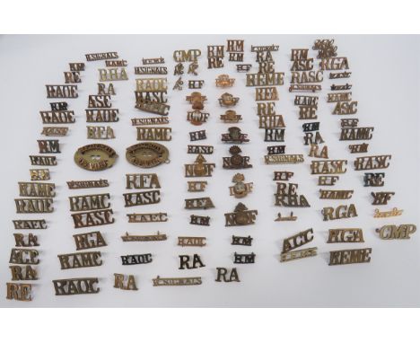 Quantity of Brass Shoulder Titlesincluding NF with grenade ... ATS ... RF ... RM ... CMP ... RASC ... RAOC ... R Signals ... 