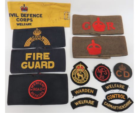 Small Selection of Home Front Armbands and Badgesarmbands consist dark blue example with printed Emergency Road Repairs ... D