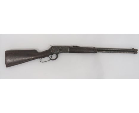 Deactivated Winchester Under Lever Carbine .44 cal, 20 inch barrel. Rear ladder sight. Lower loading tube. Flat side body wit