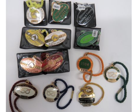 Small Selection of Uttoxeter Racecourse Badges gilt and enamel examples in various shapes with tie cords including 1984 ... 1