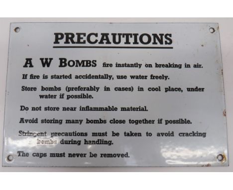 WW2 A W Bombs Enamel Plaque 12 x 8 inch, white enamel panel with black lettering Precautions A. W. Bombs. Minor edge chips to