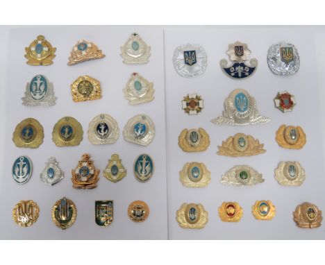 Good Selection of Ukranian Badges including anodised Navy ... Brass Navy ... Gilt anodised Navy ... White metal and enamel Of