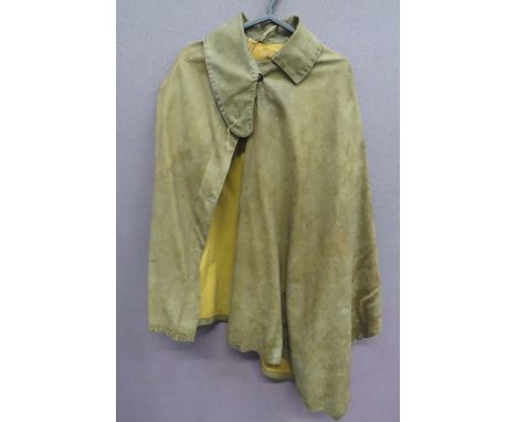 Attributed WW1 Pattern Waterproof Cape khaki tan, rubberised linen cape. Large, fold over collar. The front secured by four c