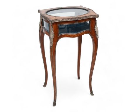 Early 20th century French walnut bijouterie table, shaped serpentine form, hinged lid inlaid with scrolling leafy branches an