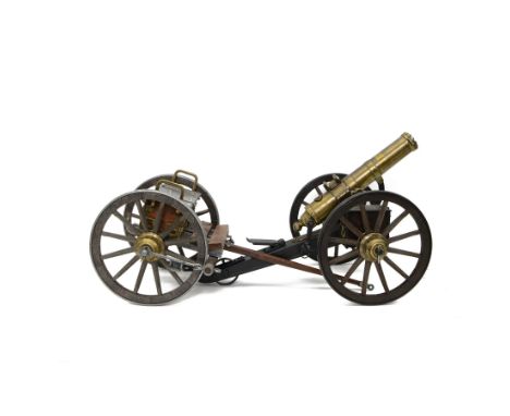 Metal model of an 1883 Gatling gun, the brass barrel revolving when arming lever is turned with brass plate inscribed 'Hartfo