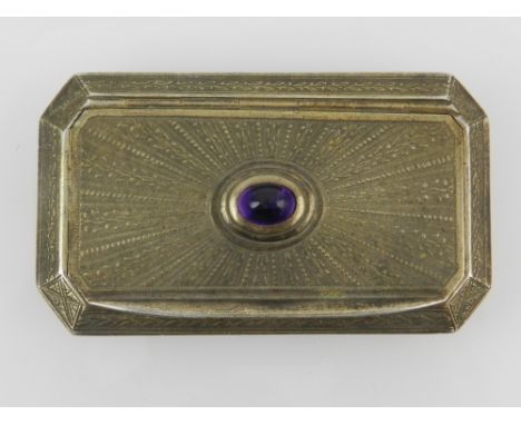 A 20th century French silver and gilt metal snuff box, having radiating engraved pattern and amethyst cabuchon to top, hallma