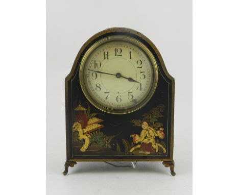 A 1920s black lacquered chinoiserie decorated mantel timepiece, having an Arabic enamel dial set cylinder movment. H.19.5cm W