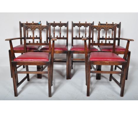 A vintage retro 20th century oak dining room suite comprising of dining table with six chairs and a sideboard. Chairs compris