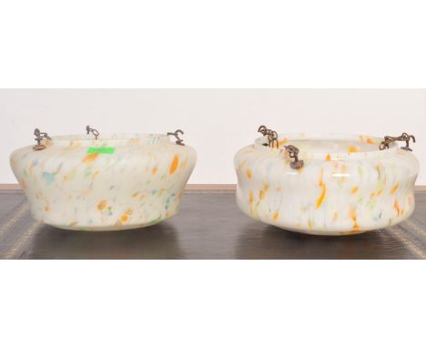 Two vintage 20th century Art Deco era glass tutti frutti mottled fly catcher ceiling light shades. Each having a white ground