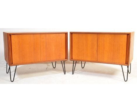 G-Plan A pair of vintage retro mid 20th century circa. 1960's teak G Plan cabinets, each having twin sliding doors opening to