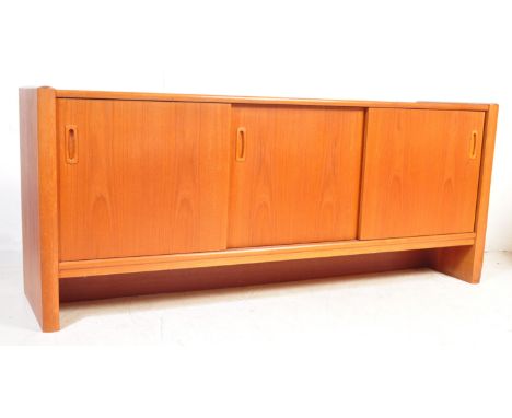 A retro vintage mid 20th Century Danish teak sideboard. Rectangular form with three sliding doors opening to reveal a shelved