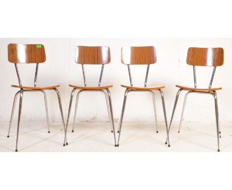 A collection of four vintage retro mid 20th century stacking chairs. The chairs having afrormosia style back rests and seat u