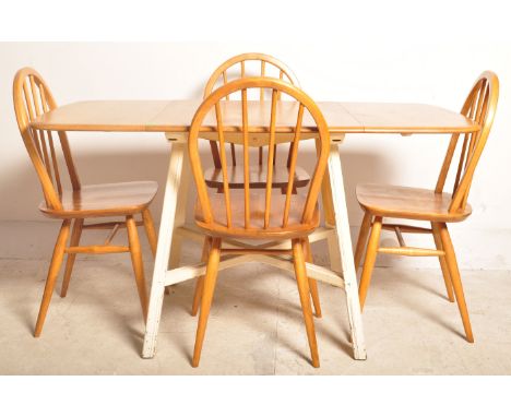 Ercol - Lucien Ercolani - A retro vintage 20th century circa 1970s Ercol teak wood dining suite. The lot to include a teak wo