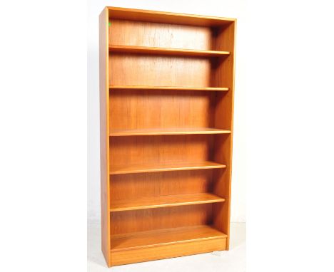 A retro vintage mid 20th Century teak book shelf. Of rectangular form with four moveable shelves raised on a plinth base. Mea