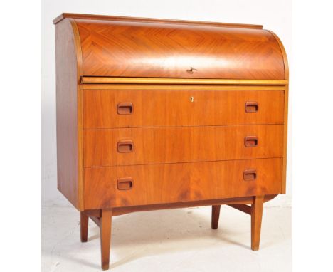 A retro vintage mid 20th century Danish cylinder roll-top desk, circa 1960, teak veneer, sliding top, the roll-top quad cut m