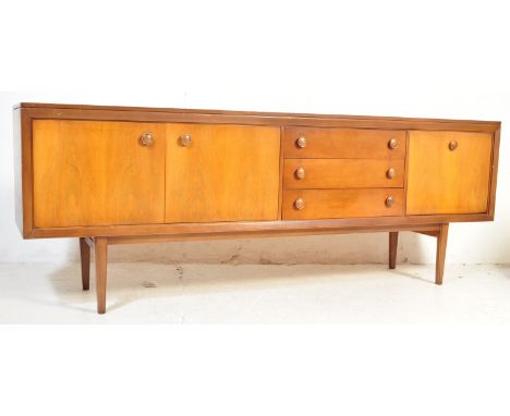 G - Plan - E Gomme - teak sideboard. The retro vintage mid 20th Century sideboard is of rectangular form with a twin cupboard
