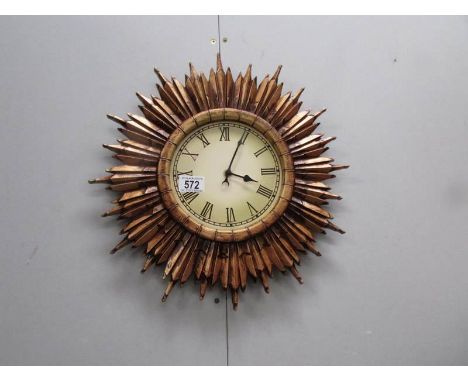 A Sunburst wall clock.