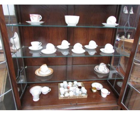 A mixed lot of cups, saucers, egg cups etc including Shelley, Royal Albert etc.,