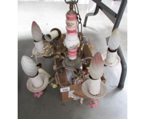 A metal and ceramic ceiling light.