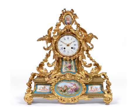 An Impressive Large Ormolu and Porcelain Mounted Striking Mantel Clock, retailed by D C Rait, A Paris, circa 1870, the elabor