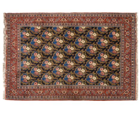 Tabriz Carpet Persian Azerbaijan The deep indigo field with an allover lattice design of naturalistic roses enclosed by brick